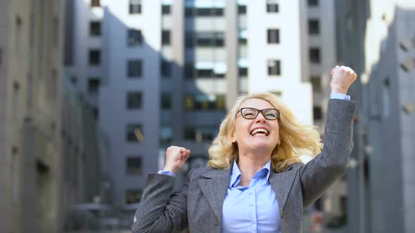 Happy Female Office Worker Celebrating Success Showing Yes Gesture, Achievement