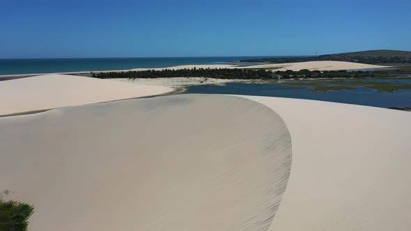 Brazilian landmark rainwater lakes and sand dunes. Jericoacoara Ceara.