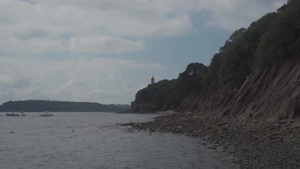 Phare Du Portzic Lighthouse and the Rocky Shore of the Ocean in the French City of Brest