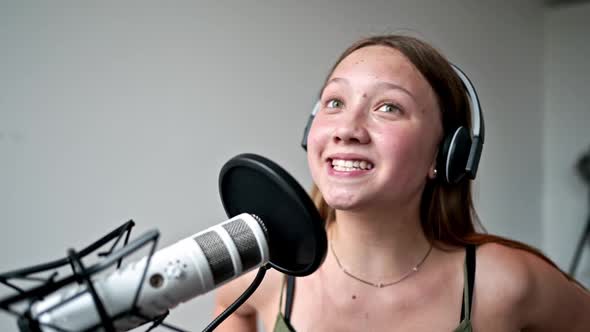 Teenage girl recording at home studio