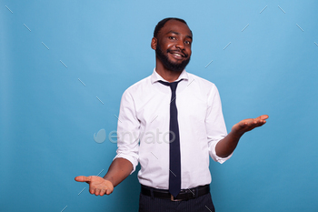 ighing options on blue background. Confident office worker doing hand gesture comparing pros and cons putting decision in balance.