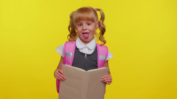 Smiling Schoolgirl Hiding Behind a Book Laugh Fooling Around Making Playful Silly Facial Expressions