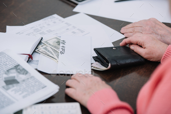 h paperwork, money and envelope with ‘roth ira’