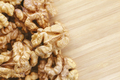 Close up picture of walnuts on a wooden background - PhotoDune Item for Sale