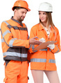 a man and a woman in orange safety gear looking at a clipboard - PhotoDune Item for Sale