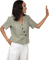 a woman wearing a green striped shirt and white pants with her hands in the air - PhotoDune Item for Sale