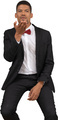 a man in a suit and bow tie smoking a cigarette - PhotoDune Item for Sale
