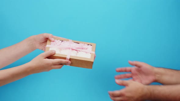 Square Cardboard Box on Blue Background