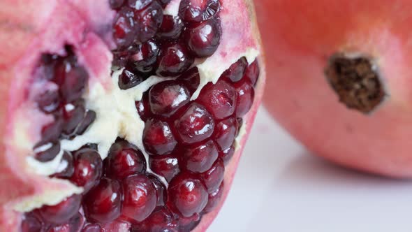 Tilting on red seeds inside Lythraceae family pomegranate  shallow DOF 4K 3840X2160 UHD video - Heal