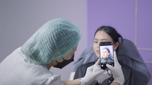 Doctor Assistant Takes Comparative Picture of Patient for Before and After Surgical Results