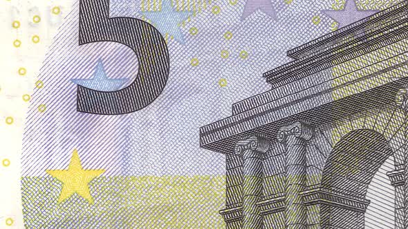 5 euro close-up motion background. Five euro cash money macro view