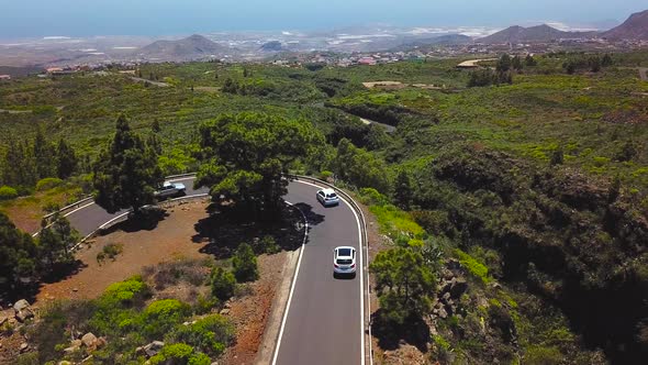 Top View of a Car Rides Along a Mountain Road on Tenerife Canary Islands Spain