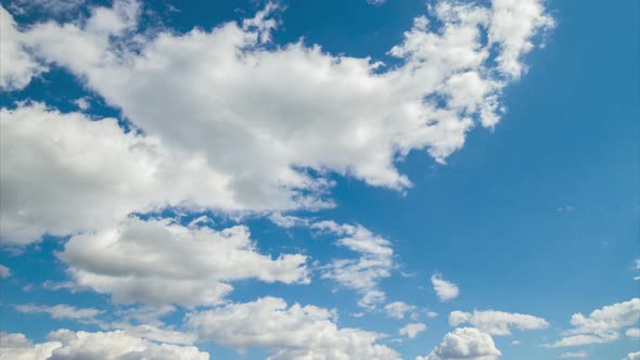 Beautiful blue sky with clouds background. Sky clouds time lapse