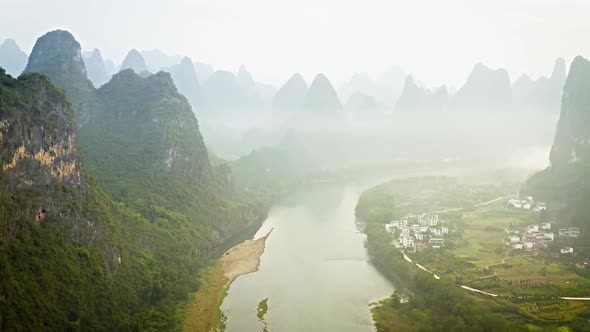 Aerial of the amazing rock formations along the Li River in China