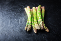 Green asparagus sprout on black board - PhotoDune Item for Sale