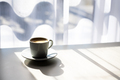 Espresso coffee cup on table near window - PhotoDune Item for Sale