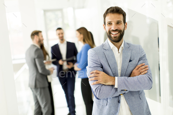 young business people talking in the background