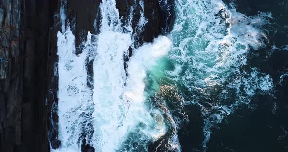 Waves hitting the cliff in Curtis island lighthouse Camden Maine USA