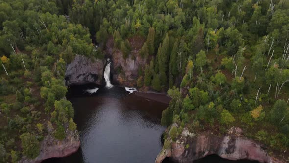 beautiful waterfall in minnesota by lake superior north shore