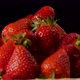 Fresh tasty strawberries in close up in the basket turns on plate - VideoHive Item for Sale