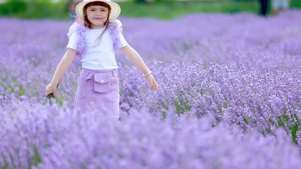 a Girl Walking in a Lavender Field