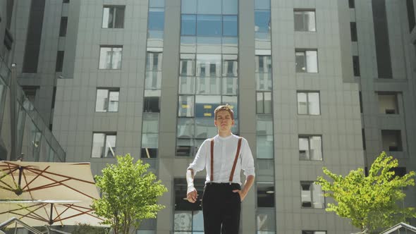 The Man Walked Forward Business Building on the Background Slow Motion