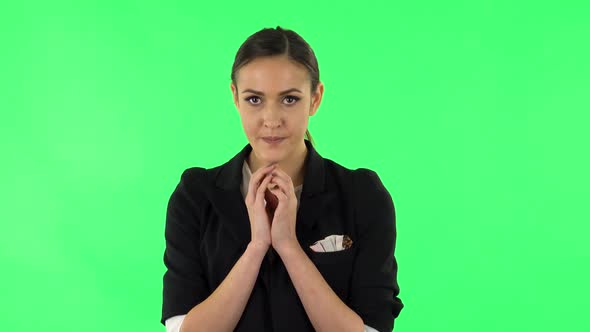 Upset Girl Looking at the Camera with Tears in Her Eyes. Green Screen