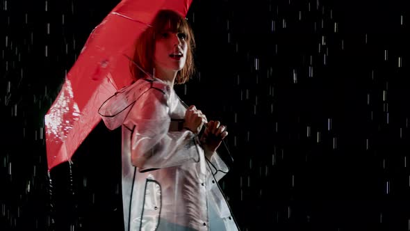 Beautiful Woman Dancing In The Rain