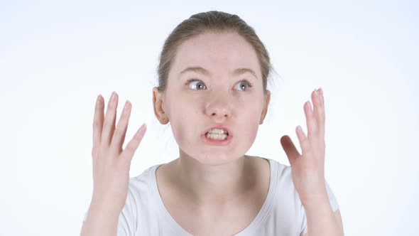 Portrait of Angry Redhead Woman Fighting