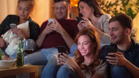 Friends with Smartphone Watching Tv at Home 76