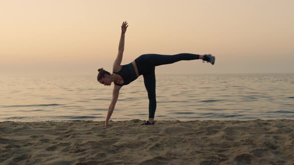 Girl Making Ardha Chandrasana Standing Beach