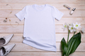 Womens white T-shirt mockup with  lily flowers, necklace - PhotoDune Item for Sale