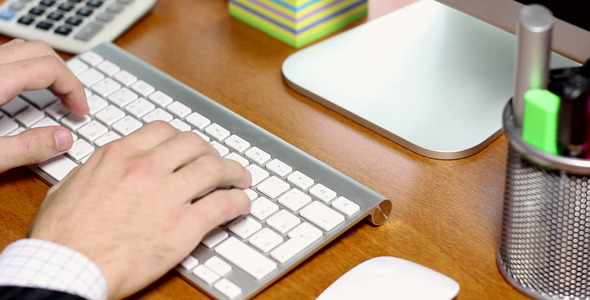 Office Desk Computer Typing And Calculating