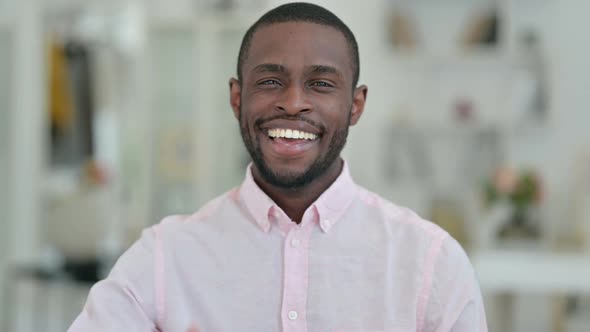 Portrait of Appreciative African Man Showing Thumbs Up