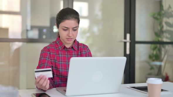 Indian Woman Making Successful Online Payment on Laptop