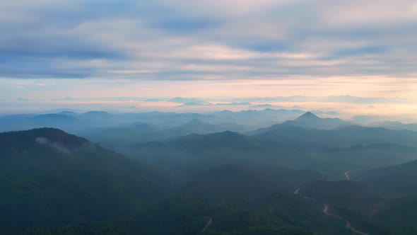 4K Aerial view of Mountains landscape with morning fog.