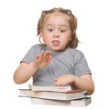 Little girl with books on white background isolate - PhotoDune Item for Sale