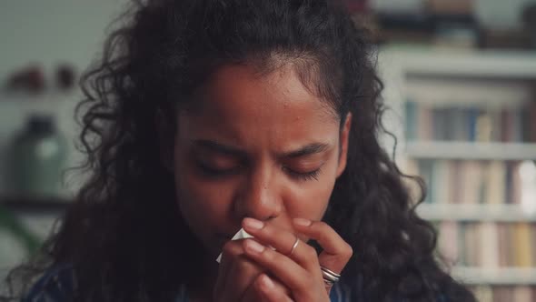 Close Up Ill Allergic Upset Young Indian Woman Blowing Running Nose in Tissue
