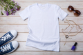 Womens white T-shirt mockup with burdock flowers - PhotoDune Item for Sale