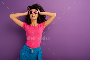 nd smiling on purple background