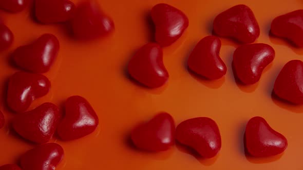 Rotating stock footage shot of Valentines decorations and candies - VALENTINES 0041