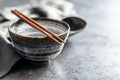 Empty bowl and chopsticks on kitchen table. - PhotoDune Item for Sale