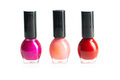 Colorful nail polish bottles isolated on white background. - PhotoDune Item for Sale