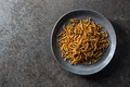 Fried salty worms. Roasted mealworms on plate. - PhotoDune Item for Sale