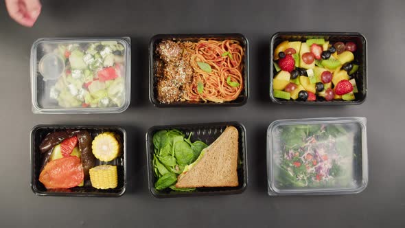 Closing Take Away Meals Top View Food Delivery in Closed Disposable Containers Balanced Nutrition