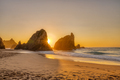 Beautiful sunset on a beach with sea stacks - PhotoDune Item for Sale
