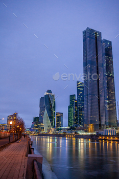 Moscow City skyscraper buildings with windows night view.