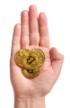 Hand holding stack of golden bitcoins - PhotoDune Item for Sale