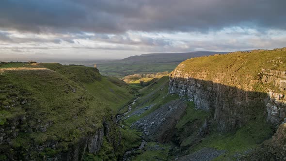 Time-lapse footage as the light fades looking down Mousegill Beck with the Eden Valley and the North