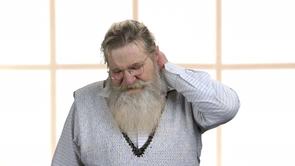 Old Bearded Man Sufferig From Neck Pain